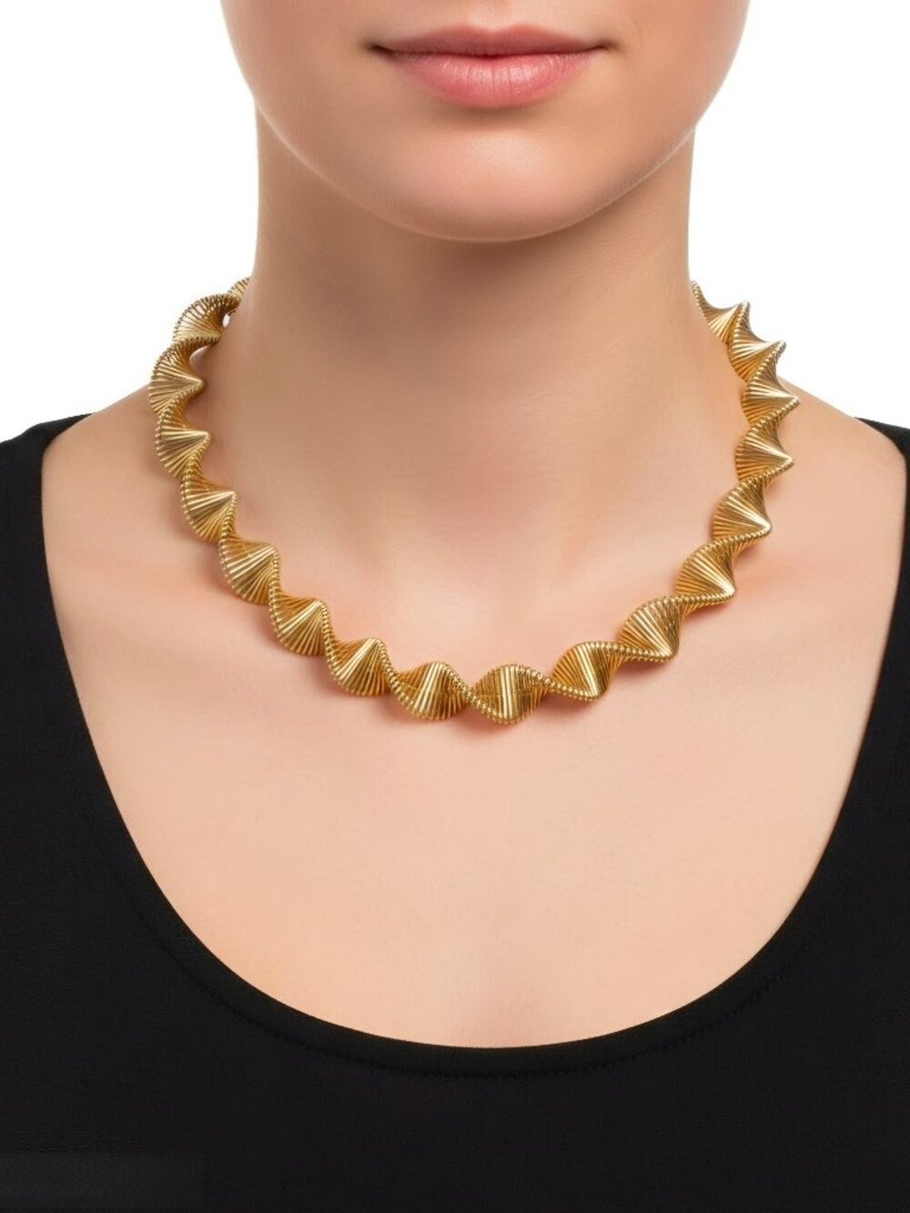 Gold-tone metal slinky statement collar/choker necklace.
